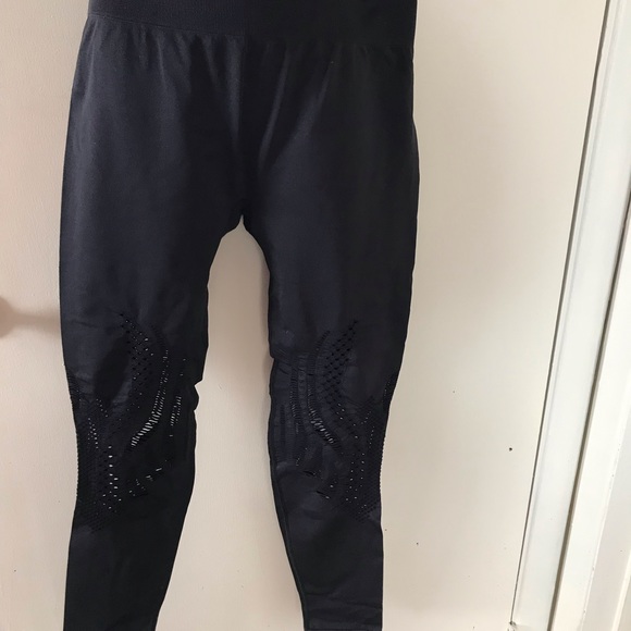 Fabletics black leggings with see through details. - Picture 1 of 3